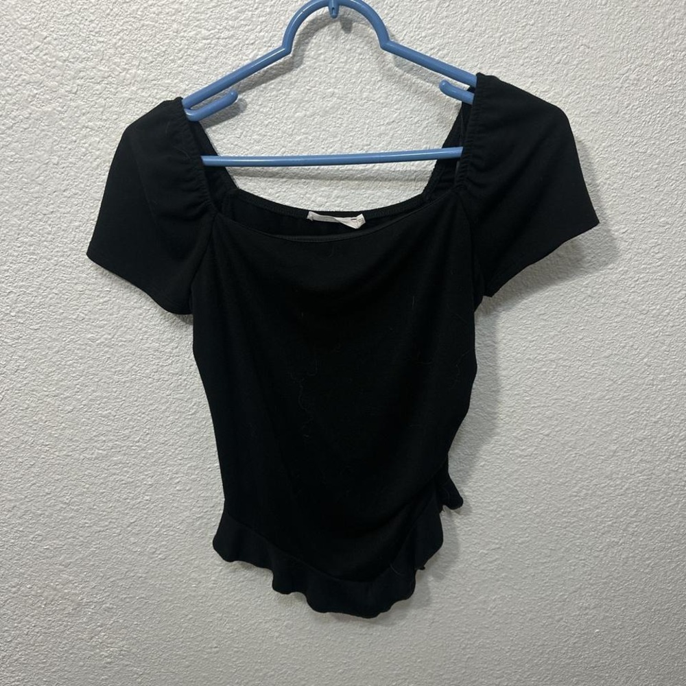 Black asymmetrical‎ ruffled hem top
